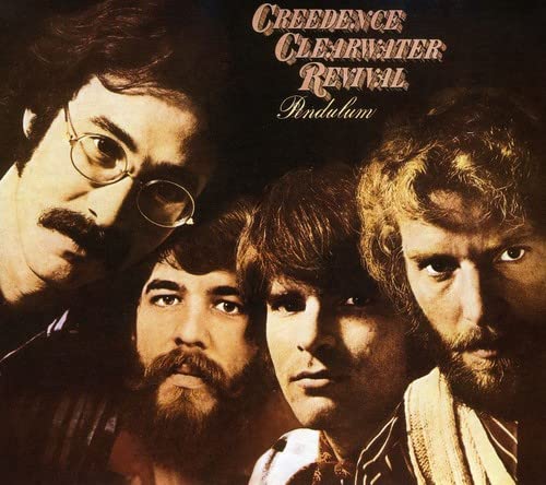 Creedence Clearwater Revival album cover featuring four men with long hair.
