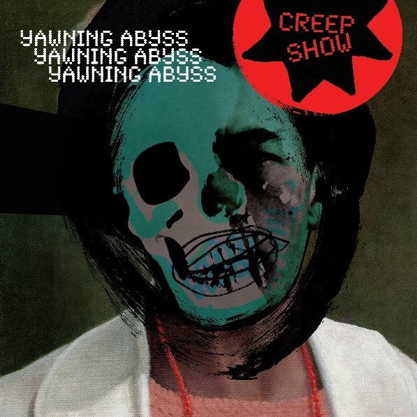 Album cover with distorted teal skull and red star, text overlays.