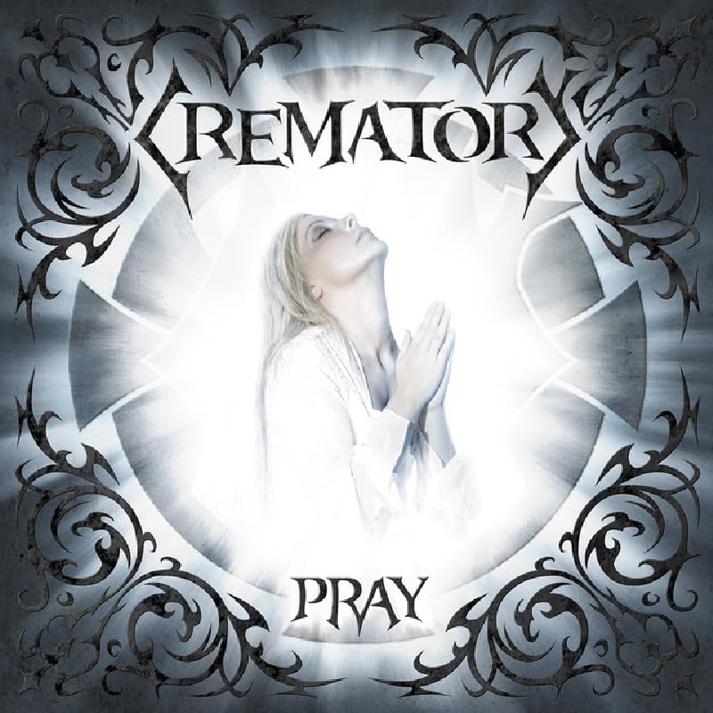 Crematory "Pray" CD cover: woman praying, ornate silver and blue design.