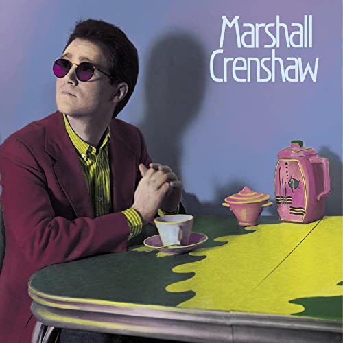 Marshall Crenshaw album cover with artist in suit and colorful still life.