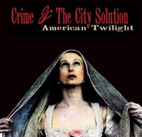 Album cover: woman in veil, red text “Crime & The City Solution”.