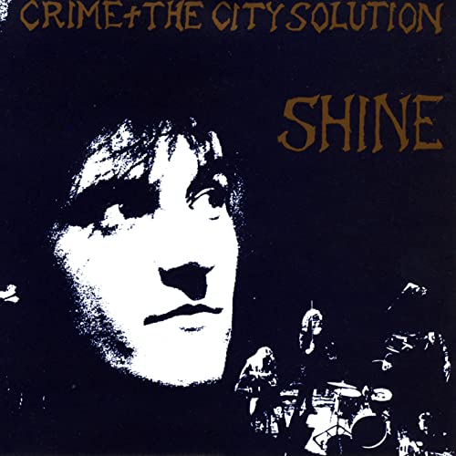 Album cover for Crime & The City Solution’s “Shine” with a portrait.