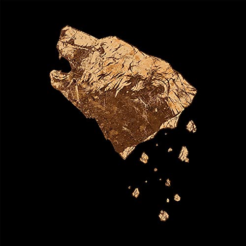 Bronze phoenix shape crumbling into pieces against a black background.