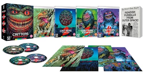 Critters Four Course Feast Blu-ray box set with cases, discs, and promotional newspaper insert.