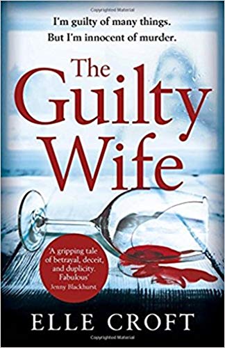 Book cover for “The Guilty Wife” with a shattered wine glass and red liquid.
