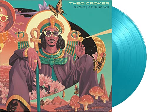 Album cover featuring a seated man with ornate Egyptian-style jewelry and blue vinyl records.