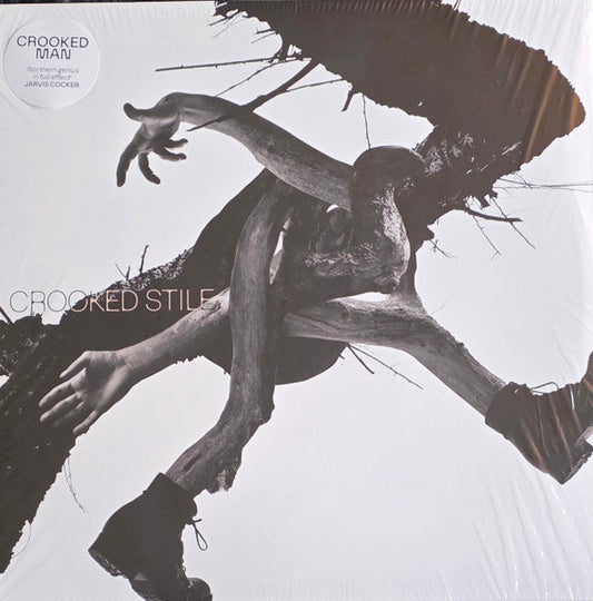 Vinyl record cover featuring distorted image of limbs against white.