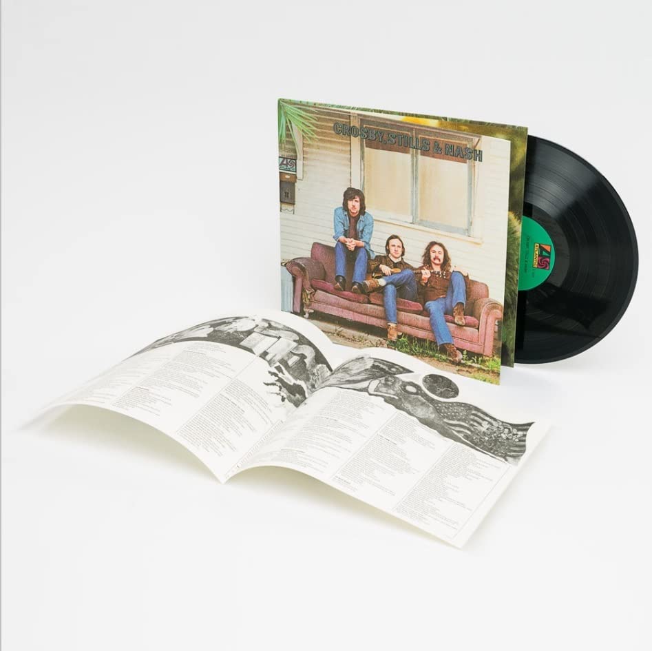 Crosby, Stills & Nash vinyl record with album cover and open lyric booklet.