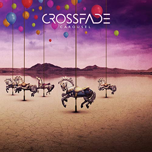 Carousel horses and balloons against a desert and cloudy sky.
