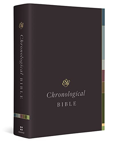 Dark gray hardcover Bible with gold lettering and colored page edges.