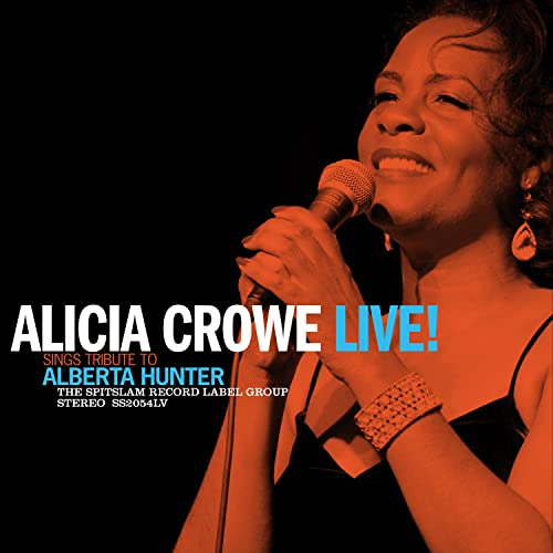 Alicia Crowe singing into a microphone on album cover.