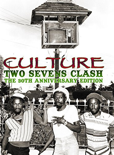 Culture album cover: three men and a clock tower in Jamaica.