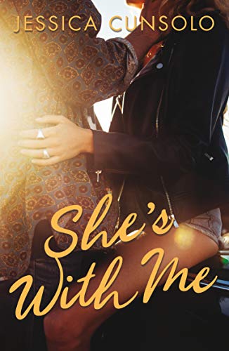 Book cover featuring a couple embracing, with golden text.