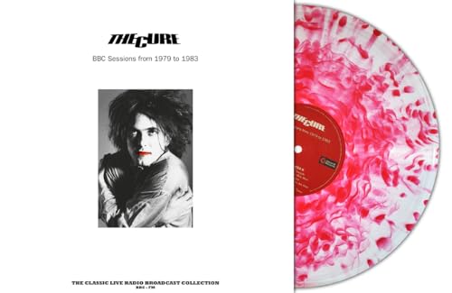 The Cure vinyl record: red cloudy disc with Robert Smith portrait.