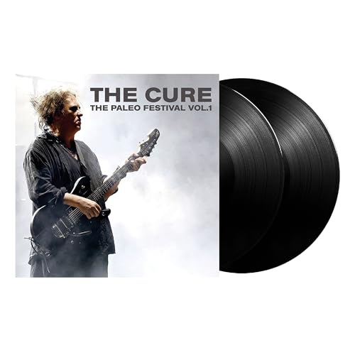 The Cure vinyl record featuring Robert Smith playing guitar.