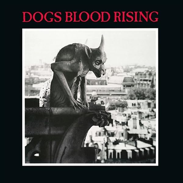 Black and white photo of a stone gargoyle overlooking a city with red text.