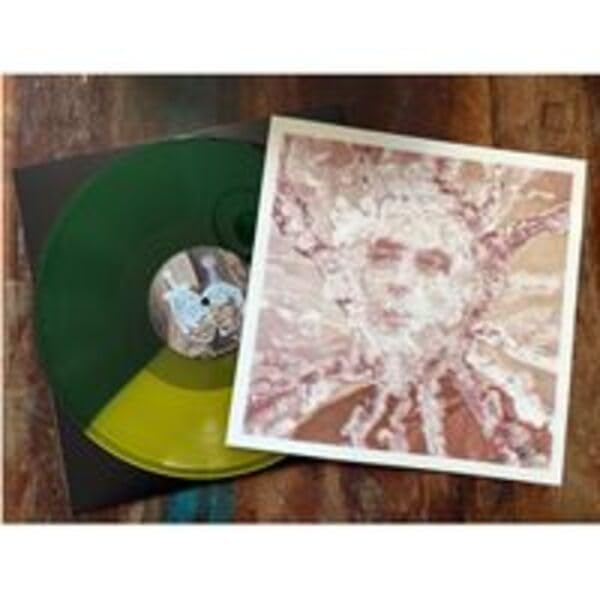 Green and yellow split vinyl record with a signed, abstract print.