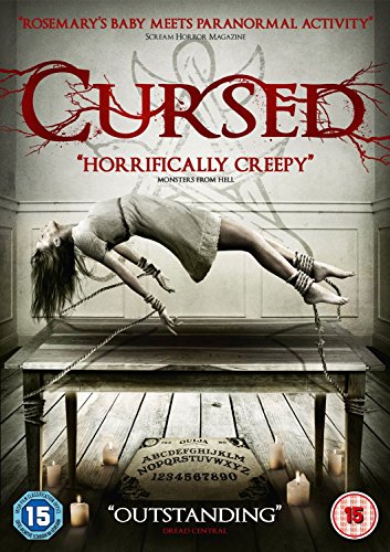 DVD cover for horror film “Cursed” showing a levitating woman tied to a table.