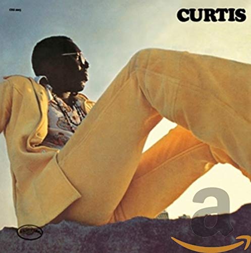 Curtis Mayfield album cover: a reclining man in a tan suit.