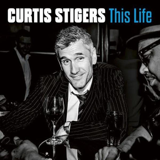 Curtis Stigers album cover, black and white photo, with text overlay.