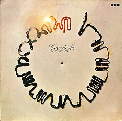 Curved Air - Midnight Wire" album cover with abstract wire-like design.