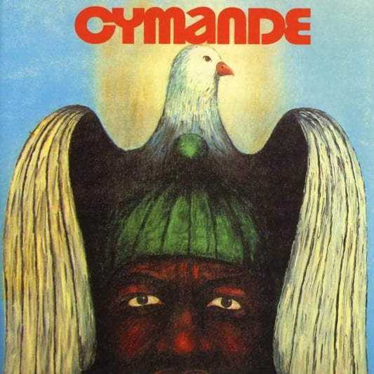 Cymande album cover: a white bird over a dark-skinned face with eyes visible.