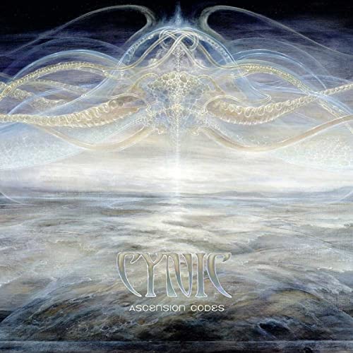 Album cover for Cynic’s “Ascension Codes” featuring abstract, swirling gold artwork.