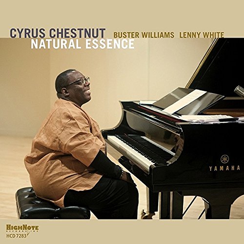 Cyrus Chestnut at a Yamaha grand piano, album cover for Natural Essence.