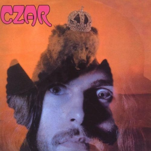 Album cover featuring a bear with a crown on a man’s head.