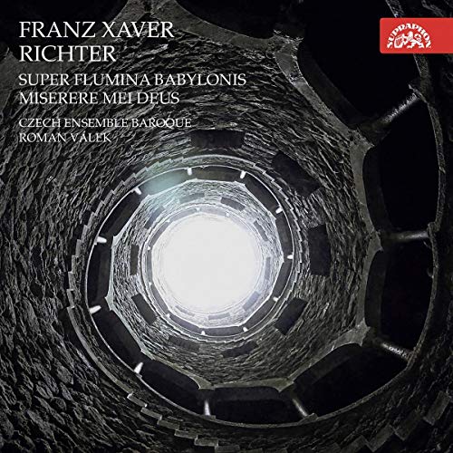 "Album cover featuring a spiral stone staircase with a bright center."