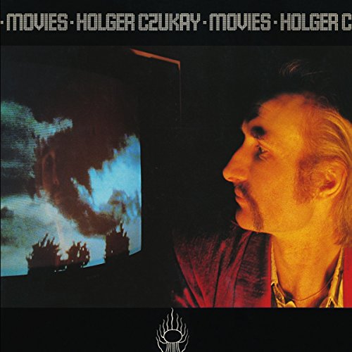 Vinyl album cover for Holger Czukay’s “Movies” featuring a man and a television.