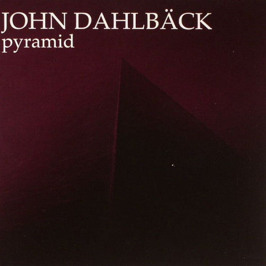 CD cover for John Dahlbäck’s “Pyramid” with a dark, triangular shape.