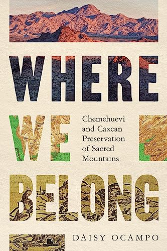 Book cover with mountains and bold text: "Where We Belong.