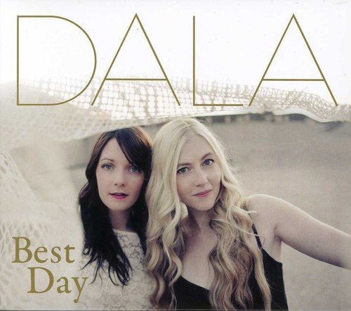 "Album cover with two women, one brunette and one blonde, against a sandy background."