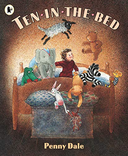 Child in bed surrounded by jumping stuffed animals and creatures.