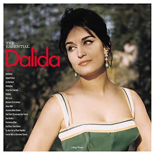 Portrait of Dalida wearing a green top and drop earrings on a vinyl cover.