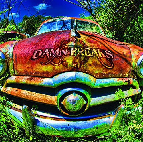 CD cover: rusted vintage car with "Damn Freaks" text overlay.