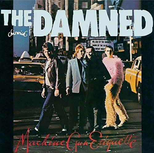 Album cover for The Damned’s “Machine Gun Etiquette” featuring four figures crossing a street.