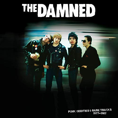 The Damned band portrait on a black background, CD cover art.