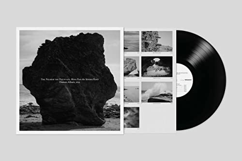 Damon Albarn vinyl record with black cover featuring a rock formation.