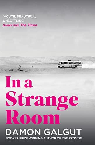 Book cover: desert landscape with vehicle, pink title “In a Strange Room.”