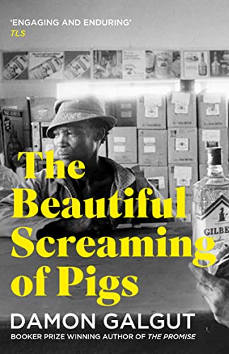 Book cover: black and white photo of a man with stacked boxes behind him.