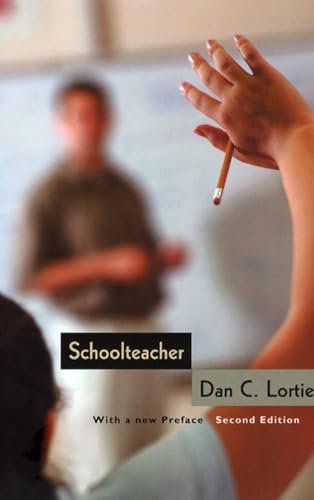 Book cover: "Schoolteacher" with blurred image of a classroom and raised hand.