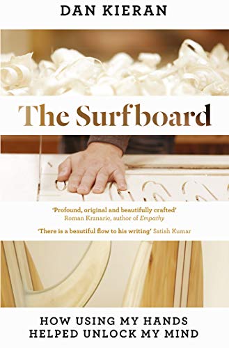 Book cover featuring a hand resting on a wooden surfboard with wood shavings above.