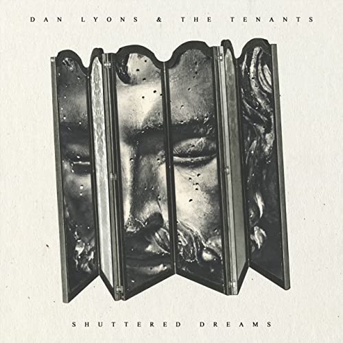Vinyl album cover: a face reflected in a folding, ornate mirror.