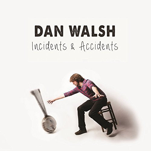 Album cover with man reaching for falling metal dustpan against a white background.