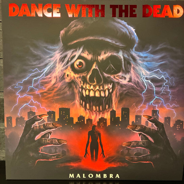 Vinyl record cover: a monstrous skull over a city landscape.