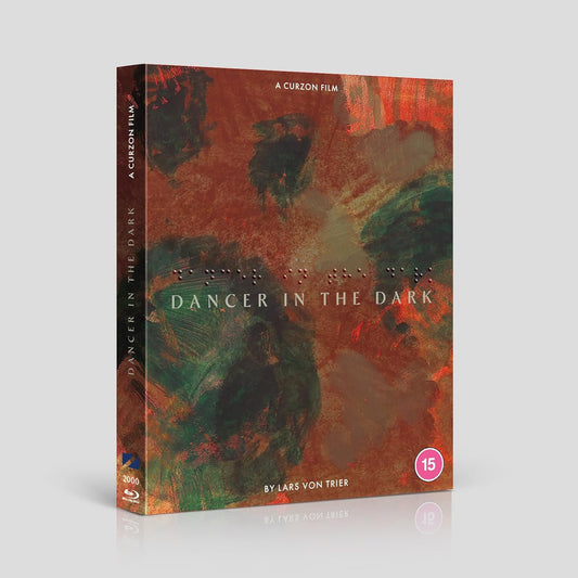 Dancer In The Dark" Blu-ray case with abstract, textured orange and green artwork.