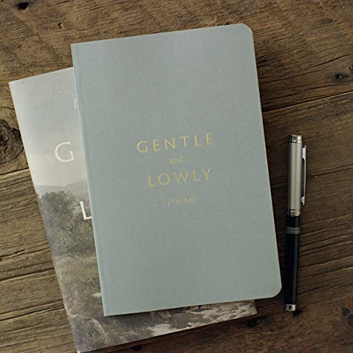 Gray journal with gold text, “Gentle and Lowly,” and a silver pen.