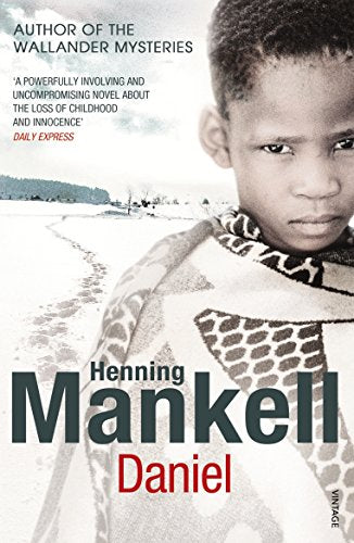 Book cover: a young boy with a patterned shawl, looking downwards.